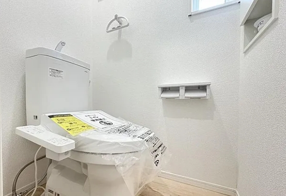 相模原市中央区共和3丁目の新築戸建て5号棟のトイレ1Fの写真