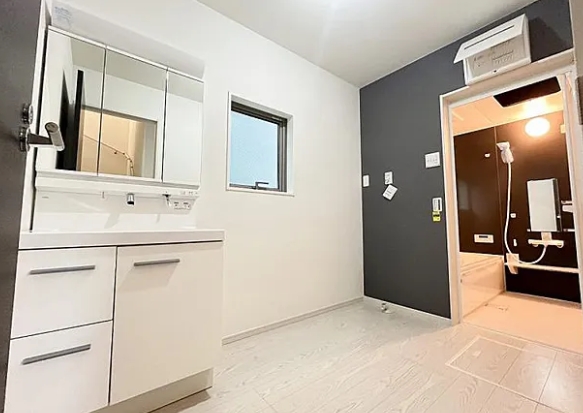 相模原市南区相南2丁目の新築戸建ての洗濯機置場の写真