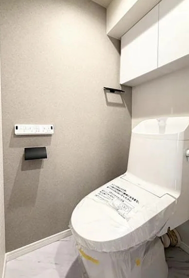 八王子市鹿島の中古マンションのトイレの写真