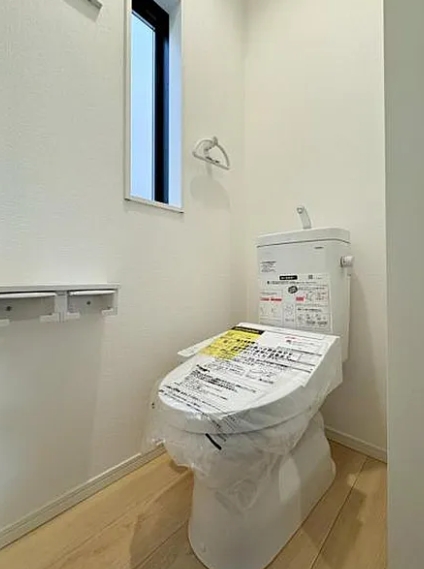 八王子市諏訪町の新築戸建て1号棟のトイレ1F