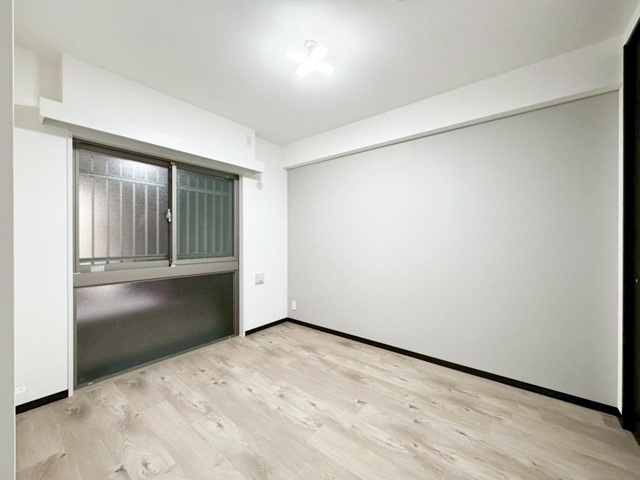 相模原市中央区共和2丁目の中古マンション1階部分の洋室の写真