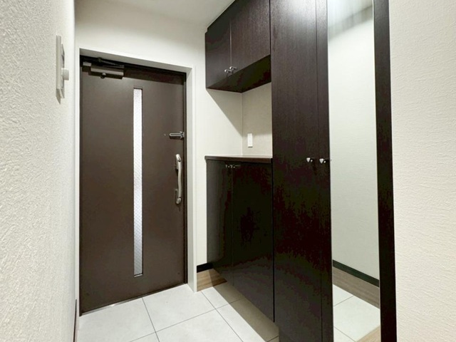 相模原市中央区共和2丁目の中古マンション1階部分の玄関の写真