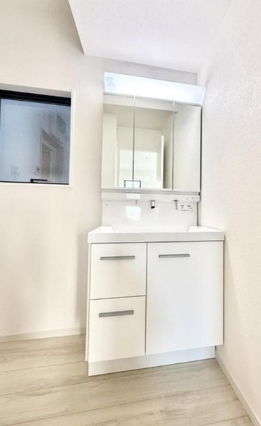 相模原市中央区南橋本1丁目の新築戸建て1号棟の洗面化粧台の写真