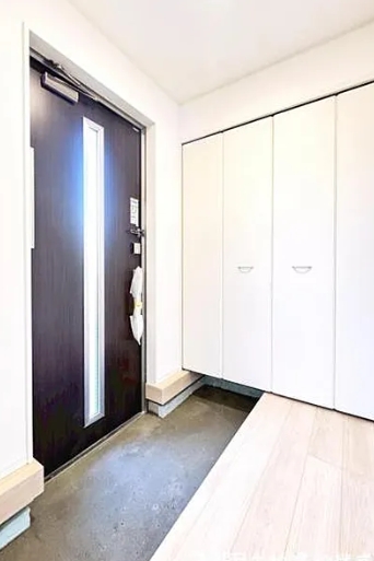 相模原市中央区田名の新築戸建て1号棟の玄関の写真