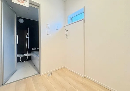 相模原市中央区田名の新築戸建て1号棟の洗濯機置場の写真