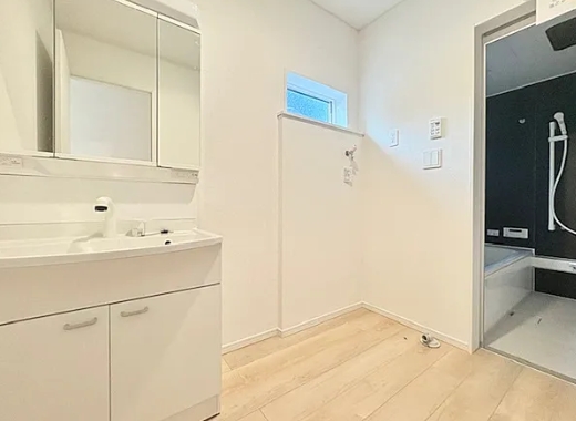 相模原市中央区田名の新築戸建て2号棟の洗濯機置場の写真