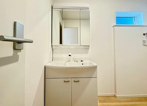 相模原市中央区田名の新築戸建て2号棟の洗面化粧台の写真