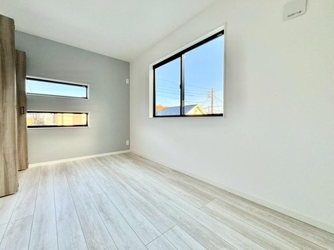 相模原市緑区若葉台1丁目の新築戸建ての洋室2の写真