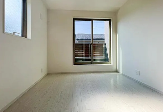 相模原市南区の新築戸建て1号棟の洋室1の写真