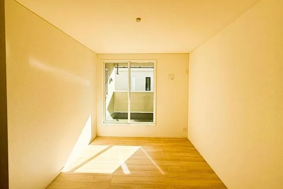 相模原市中央区上溝の新築戸建て5号棟の洋室1の写真