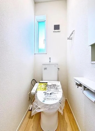 相模原市中央区田名の新築戸建て1号棟のトイレ1Fの写真