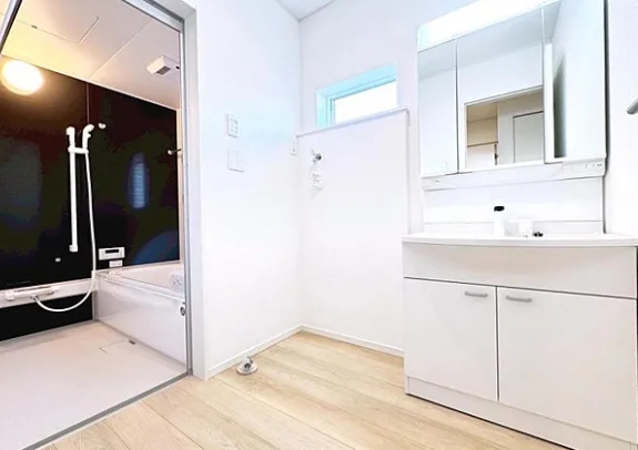 相模原市中央区田名の新築戸建て1号棟の洗面化粧台の写真