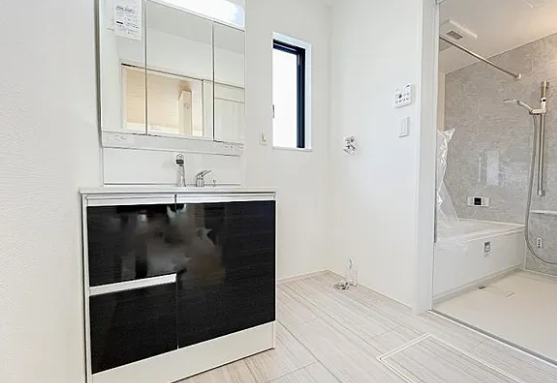 町田市原町田2丁目の新築戸建てAの洗濯機置場の写真