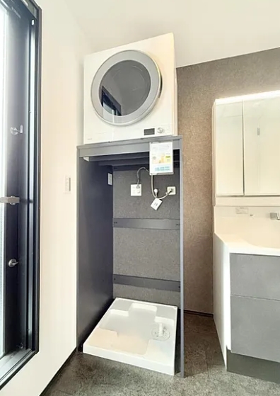 町田市本町田の新築戸建て2の洗濯機置場の写真