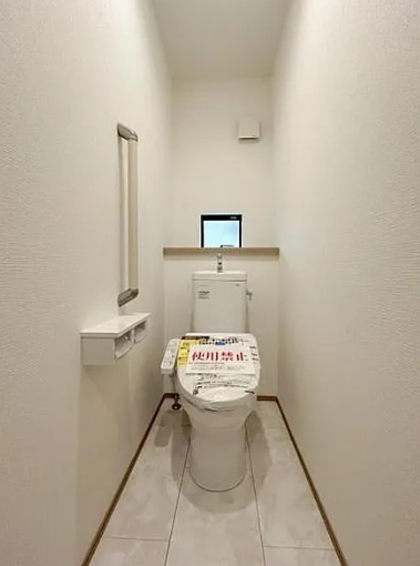 町田市鶴川4丁目の新築戸建てA号棟のトイレ1Fの写真