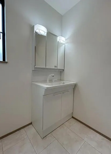 町田市鶴川4丁目の新築戸建てA号棟の洗面化粧台の写真