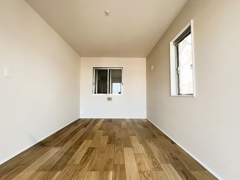 八王子市東浅川町の新築戸建ての洋室1の写真