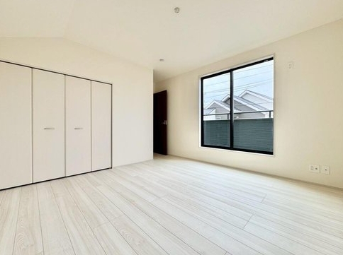 八王子市泉町の新築戸建ての洋室1の写真
