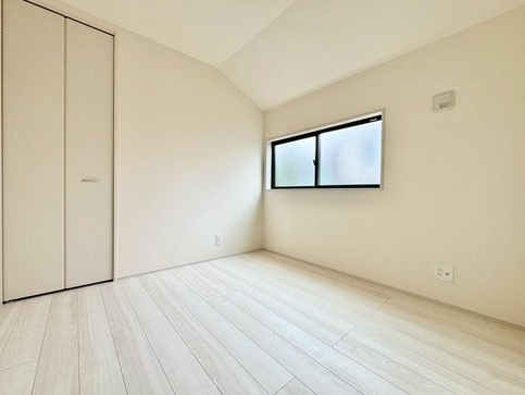 八王子市泉町の新築戸建ての洋室2の写真