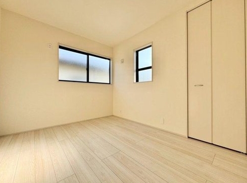 八王子市泉町の新築戸建ての洋室2の写真