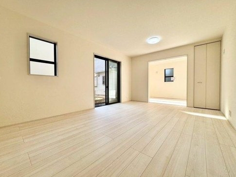 八王子市泉町の新築戸建てのリビングの写真