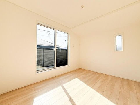 八王子市元八王子町の新築戸建て1号棟の洋室2の写真