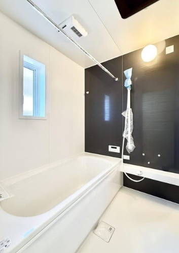 八王子市元八王子町の新築戸建て4号棟のバスルームの写真