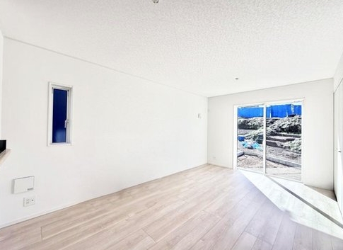八王子市元八王子町の新築戸建て4号棟のリビングの写真