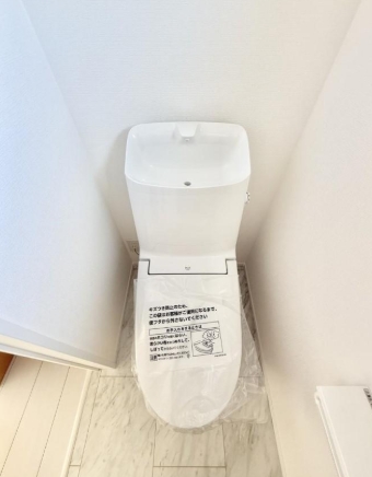 八王子市谷野町の新築戸建て2号棟のトイレ1fの写真