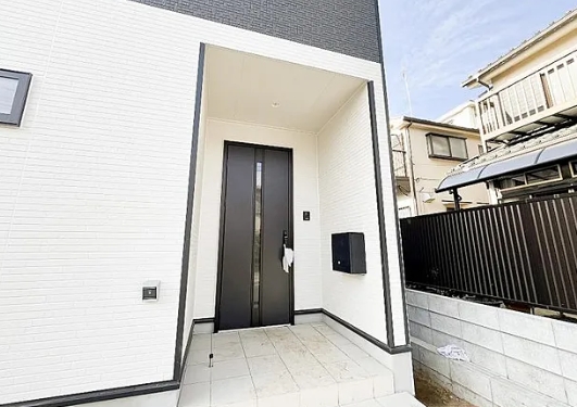 町田市相原町の新築戸建て1号棟の玄関の写真