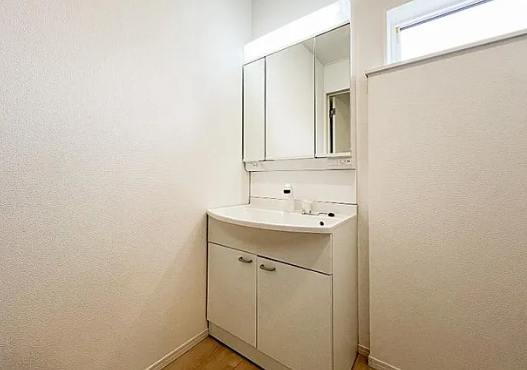町田市相原町の新築戸建て1号棟の洗面化粧台の写真