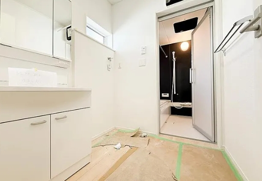 町田市相原町の新築戸建て4号棟の洗濯機置場の写真