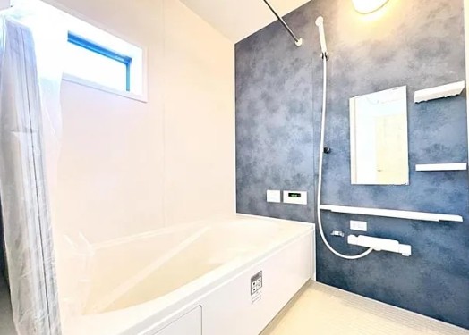 町田市小山町の新築戸建ての1号棟のバスルームの写真