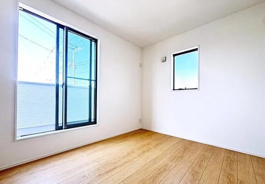 町田市小山町の新築戸建ての1号棟の洋室2の写真