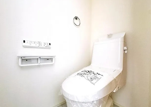 町田市小山町の新築戸建ての1号棟のトイレ1Fの写真