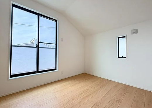 町田市小山町の新築戸建ての2号棟の洋室1の写真