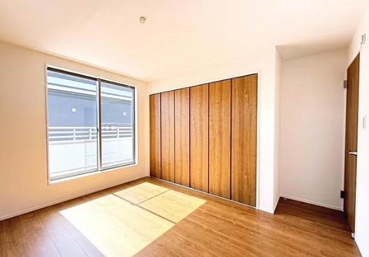 町田市小山町の新築戸建ての5号棟の洋室1の写真