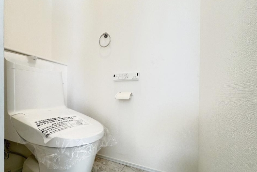 町田市小山町の新築戸建て5号棟のトイレ1fの写真