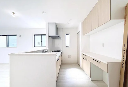 町田市小山町の新築戸建ての6号棟のキッチンの写真