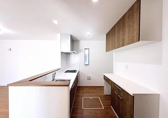 町田市小山町の新築戸建ての7号棟のキッチンの写真