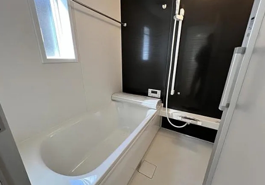 町田市常磐町の新築戸建ての1号棟のバスルームの写真