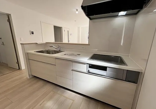 町田市常磐町の新築戸建ての1号棟のキッチンの写真