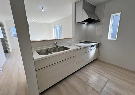 町田市常磐町の新築戸建ての2号棟のキッチンの写真