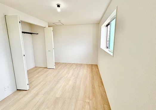 町田市鶴川4丁目の新築戸建て1号棟の洋室1の写真