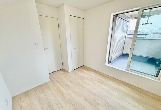 町田市鶴川4丁目の新築戸建て1号棟の洋室2の写真