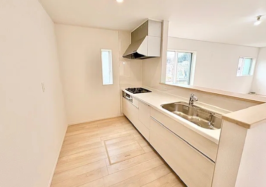 町田市鶴川4丁目の新築戸建て1号棟のキッチンの写真