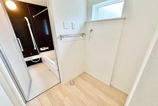 町田市鶴川4丁目の新築戸建て2号棟の洗濯機置場の写真