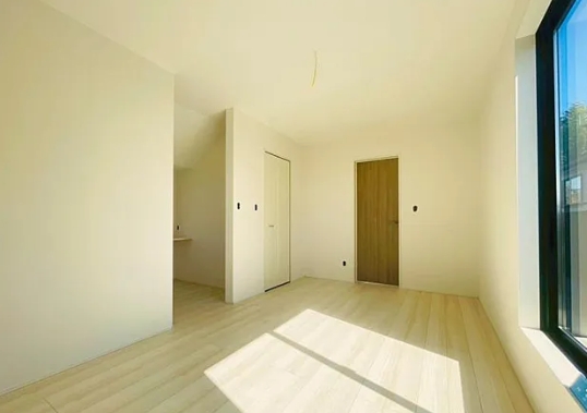 八王子市石川町の新築戸建て1号棟の洋室1の写真