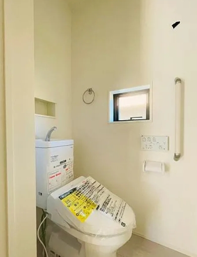 八王子市石川町の新築戸建て1号棟のトイレ1fの写真