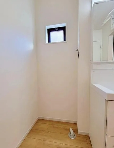 八王子市長房町の新築戸建ての洗濯機置場の写真